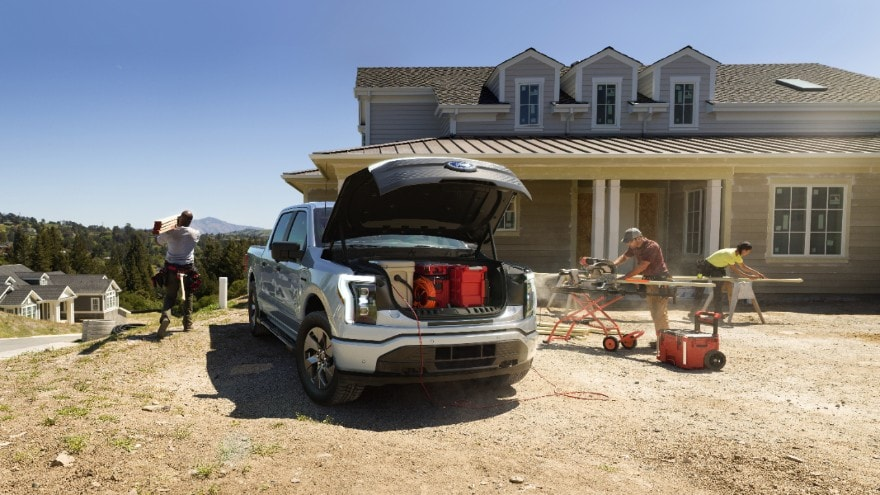 image of f-150 lightning all-electric truck with power tools plugged into it