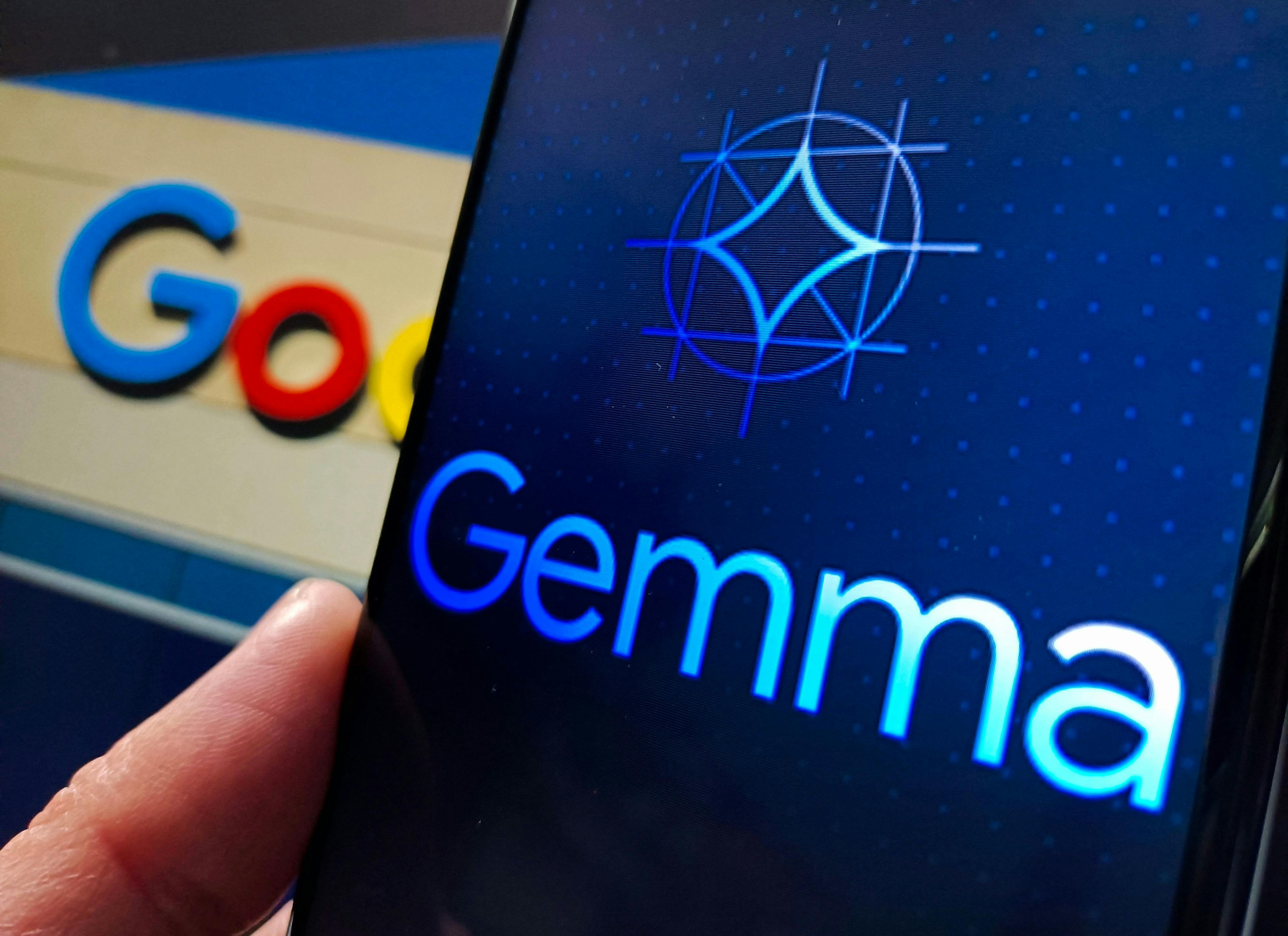 A screen with a logo for Gemma set in front of a partially visible Google logo